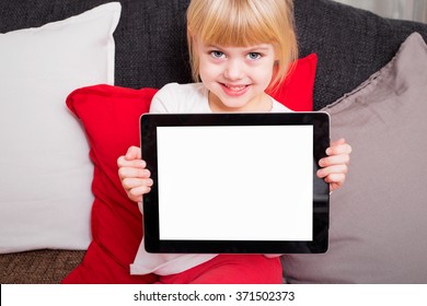 Little Kid Holding Tablet And Smiling 