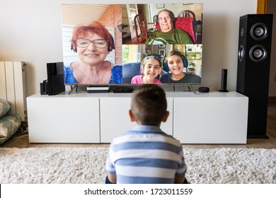 Little Kid Making A Video Call On Tv