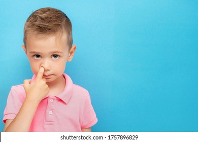 Little Kid Picks Up In His Nose. Bad Habits Concept