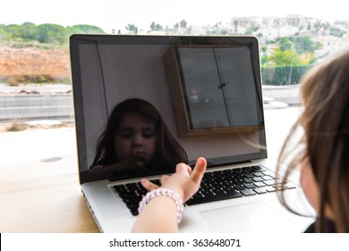 Little Kid Playing With Laptop