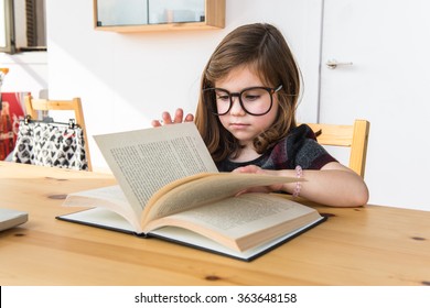 Little Kid Reading A Book