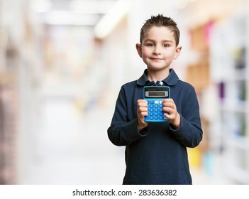 Little Kid Using Calculator