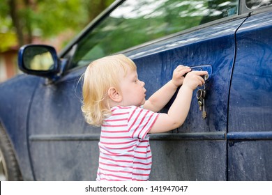 Little Kid Wants To Open A Car Door Key