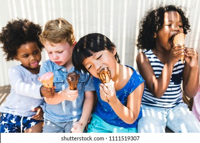 Little Kids Eating Yummy Ice Cream