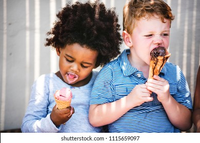 Little Kids Eating Yummy Ice Cream