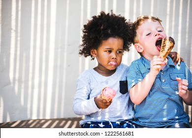 Little Kids Eating Yummy Ice Cream