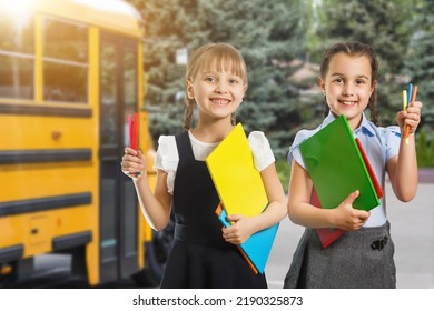 Little kids schoolchildren pupils students, the school bus. Welcome back to school. The new academic semester year start - Shutterstock ID 2190325873