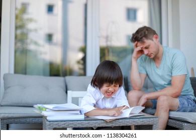 Little Lazy Boy Is Screaming While Doing Homework With His Dad Feeling Stress And Tired. Back To School Concept 