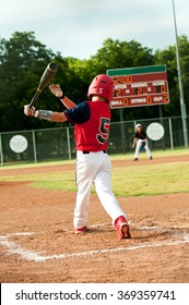 Little League American Baseball Kid Batting