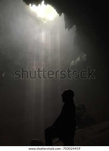 Little Light Through Darkness Cave Stock Photo Edit Now