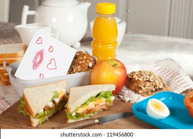 Little Love Note Put Into A Lunchbox On The Breakfast Table