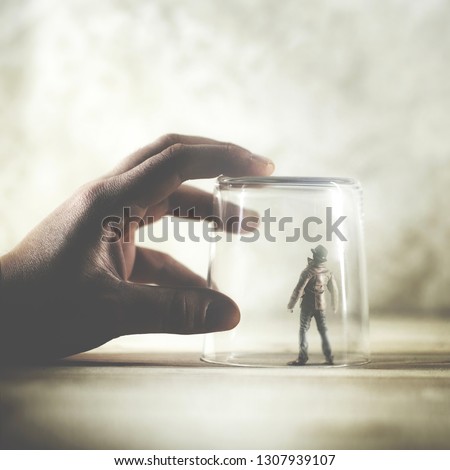 little man trapped in a glass, surreal concept