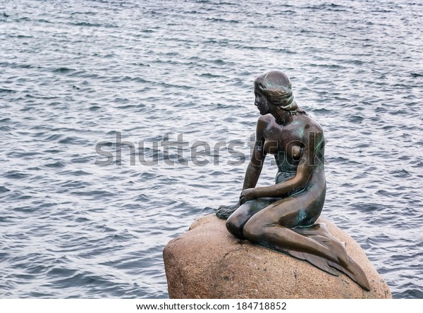 The\
Little Mermaid is a bronze statue by Edvard Eriksen, depicting a\
mermaid. The sculpture is displayed on a rock by the waterside at\
the Langelinie promenade in Copenhagen,\
Denmark