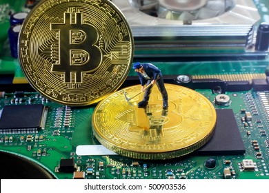 A little miner is digging for bitcoin with graphic card. conceptual image for bitcoin mining and crypto currency.