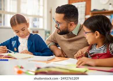 Little multiethnic girls in classroom asking for help in solving sums to male teacher. Close up of primary children asking doubt and showing notebook to teacher during lesson at school. - Powered by Shutterstock