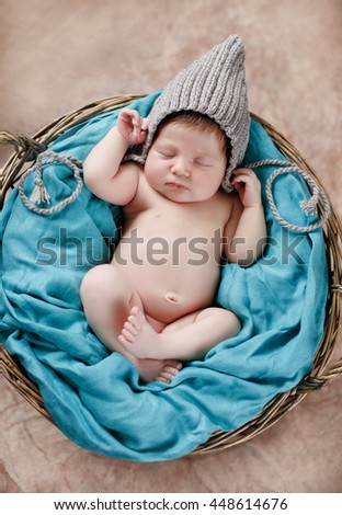 Similar – Newborn baby girl sleeping lying on bed next to mother’s hand