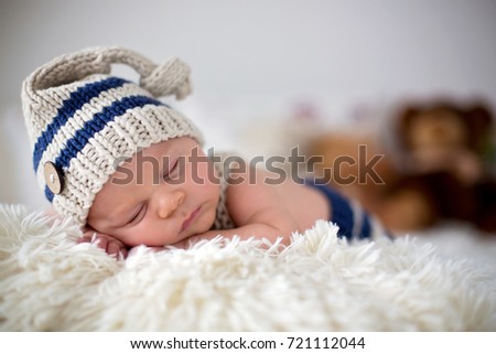 Similar – Baby girl with pompom hat sleeping