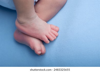 Little newborn baby human feet with toes and toenails close up - Powered by Shutterstock