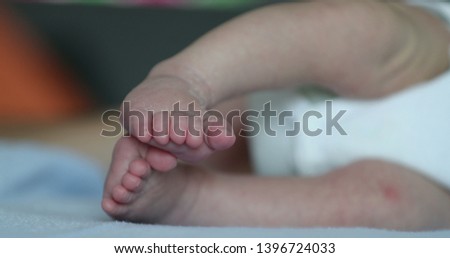 Little Newborn baby infant feet close-up macro, first week of life