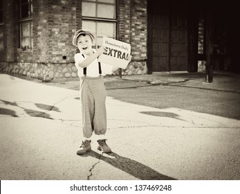 Little old newsboy holding out the newspaper and yelling "Extra" - Shutterstock ID 137469248