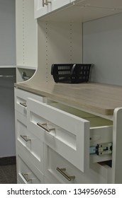 A little open drawer on the new closet organizer and shelf unit. 