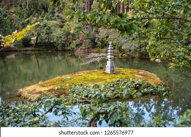 Little Pagoda On The White Snake Mound In The Pond Of Kinkaku-ji Temple, Kyoto, Japan