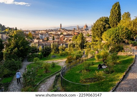 A little park in Florence with the cityscape in background.