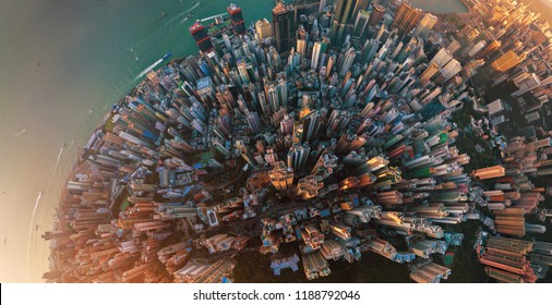 Little planet. Aerial view of Hong Kong Downtown. Financial district and business centers in smart city in Asia. Top view. Panorama of skyscraper and high-rise buildings.