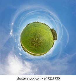 Little Planet.  Spherical View  In A Field Near A Road With Rapeseed In Sunny Day