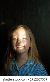 Little Pretty Girl Smiling With Sunny Bunny On Face. Cute Child With Blue Eyes Laughing. Long Blond Hair. Vintage Lens Kids Home Portrait In Daylight. Growing Up Psychology Personal Development.