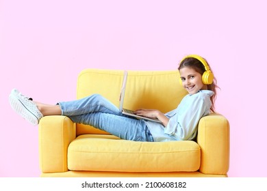 Little Programmer Using Laptop On Color Background