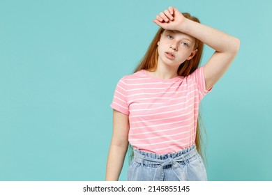 Little puzzled confused tired sick redhead kid girl 12-13 years old in pink striped t-shirt put hand on head forehead isolated on pastel blue background studio Children lifestyle childhood concept. - Shutterstock ID 2145855145