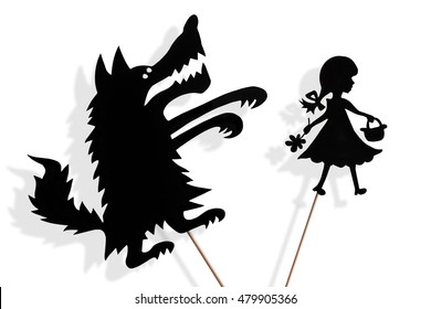 Little Red Riding Hood and the Big Bad Wolf shadow puppets and their shades on white background - Shutterstock ID 479905366