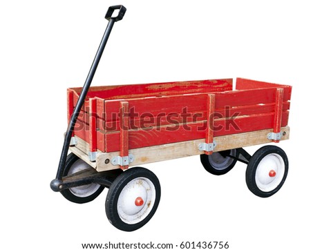 Little red wood wagon. Weathered. Faded. Isolated on white.
