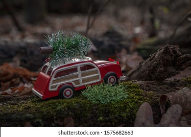 Little Red Woody Station Wagon With Christmas Tree In The Woods