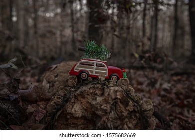 Little Red Woody Station Wagon With Christmas Tree In The Woods