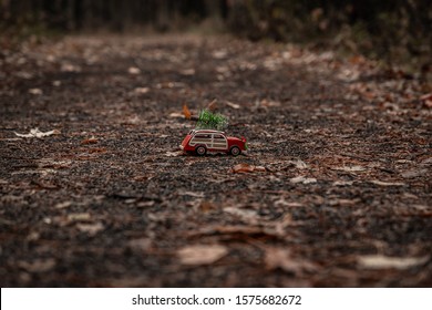 Little Red Woody Station Wagon With Christmas Tree In The Woods