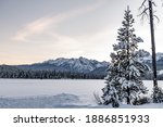 Little Redfish Lake covered with snow at sunset