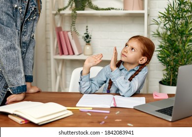 Little Redhead Child Girl Child Does Not Want To Study Online. Mom Makes Daughter Learn Lessons. Hard Online Lesson At Home