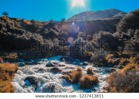 little river flowing through Ashburton Lakes District, South Island, New Zealand