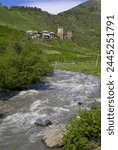 Little river running below a fortified mountain village, Svanetia, Georgia, Caucasus, Central Asia, Asia