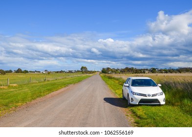 Little River, VIC/Australia-Sept 29th 2017: A White Toyota Car Parking On Side Of A Rural Road.