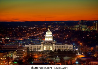 Little Rock Capitol and city lights after sunset.
