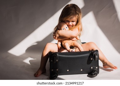  Little Sad Depressed Girl Holding Her Toy And Begging For Help 