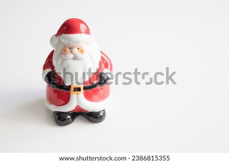 Little Santa Claus Christmas holliday decoration toys on white background copy space background