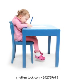 Little Scholar In The School Desk.