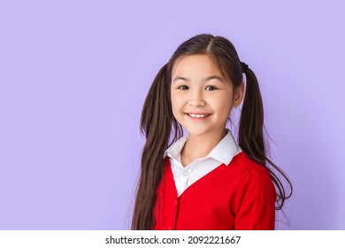 Little Schoolgirl On Color Background