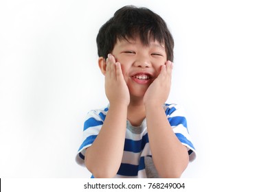 Little Shy Asian Boy Touching His Own Cheeks, Isolated On White Background.