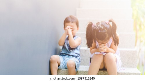 Little Sister Praying With Her Baby Brother From Covid-19 Coronavirus.Prayer Kids Pray To GOD Help.Christian Little Girl And Toddler Boy Stay At Home From Lockdown.Worship At Home Turn To Online.