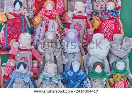 Little slavic folk rag dolls - mascots associated with heathen traditions. In middle row dolls of Motherhood or Mother in Childbirth, amulets for happy motherhood. Handmade souvenirs or gifts on fair